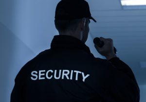Security guard with flashlight- Security guard for hire Sydney, NSW